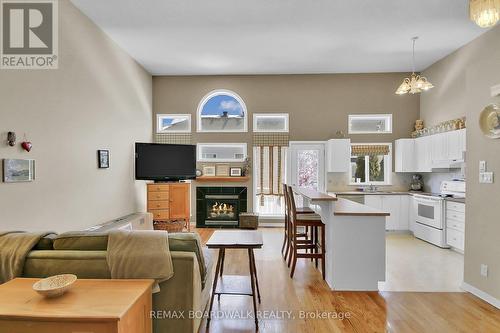 5 Maple Park Private, Ottawa, ON - Indoor Photo Showing Kitchen With Fireplace