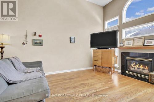 5 Maple Park Private, Ottawa, ON - Indoor Photo Showing Living Room With Fireplace