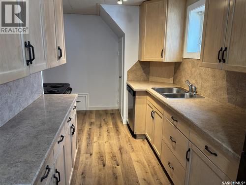 1318 B Avenue N, Saskatoon, SK - Indoor Photo Showing Kitchen With Double Sink