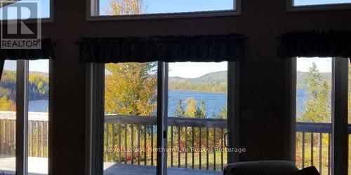 1055E Argo Run, Mattawan, ON -  Photo Showing Other Room With Body Of Water