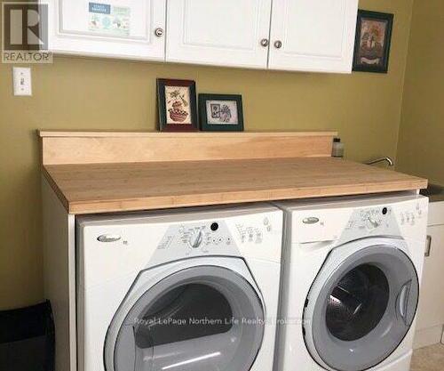 1055E Argo Run, Mattawan, ON - Indoor Photo Showing Laundry Room
