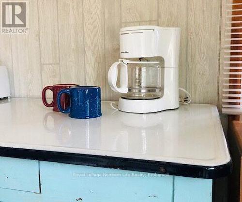 1055E Argo Run, Mattawan, ON - Indoor Photo Showing Laundry Room