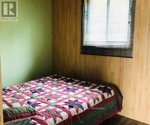 1055E Argo Run, Mattawan, ON - Indoor Photo Showing Bedroom