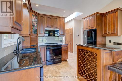 1133 Sassy Tree Lane, Frontenac (Frontenac South), ON - Indoor Photo Showing Kitchen