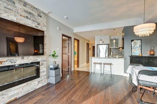 Living Room - 606-5715 Rue Jean-Talon E., Montréal (Saint-Léonard), QC - Indoor With Fireplace