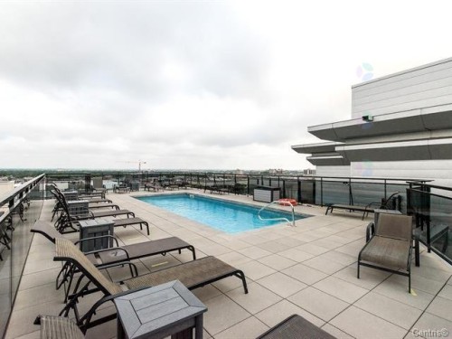 Pool - 606-5715 Rue Jean-Talon E., Montréal (Saint-Léonard), QC - Outdoor With In Ground Pool