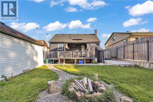 Rear view of property with a wooden deck and a fenced backyard - 84 Avalon Place, Kitchener, ON - Outdoor With Deck Patio Veranda