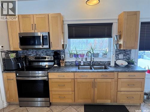 237 Eagle Point Drive, La Ronge, SK - Indoor Photo Showing Kitchen With Double Sink