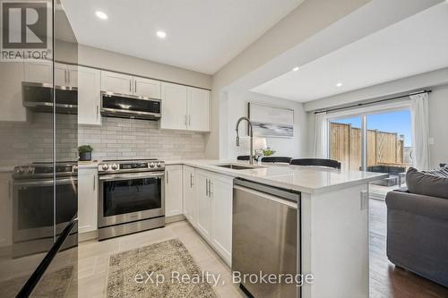 54 Miranda Path, Woolwich, ON - Indoor Photo Showing Kitchen With Upgraded Kitchen