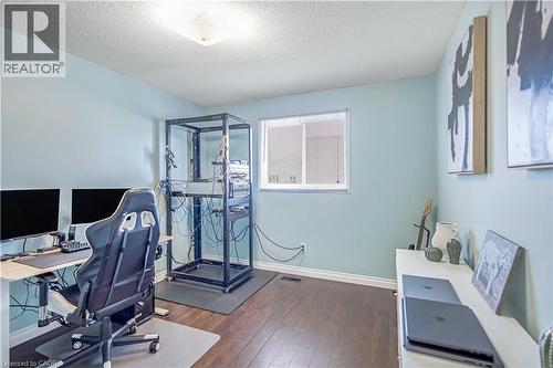 Home office with dark wood-type flooring and a textured ceiling - 8 Brantdale Avenue, Hamilton, ON - Indoor Photo Showing Office