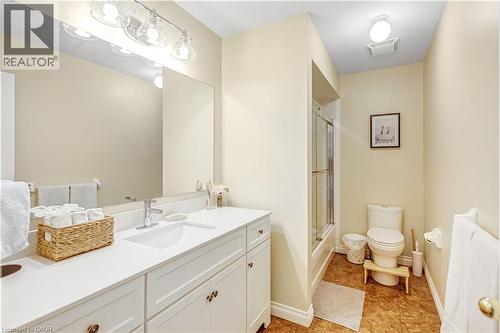 Full bath featuring vanity and enclosed tub / shower combo - 8 Brantdale Avenue, Hamilton, ON - Indoor Photo Showing Bathroom