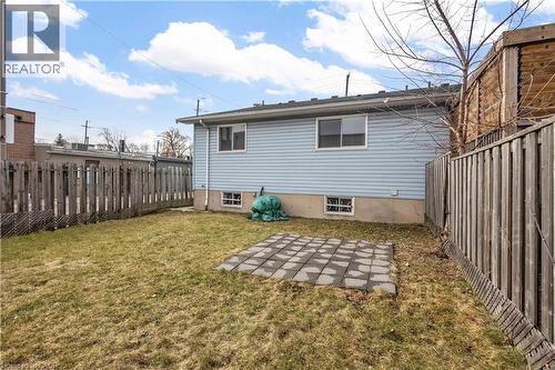 Back of house with a fenced backyard and a patio - 8 Brantdale Avenue, Hamilton, ON - Outdoor