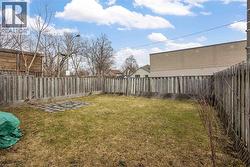 View of fenced backyard - 