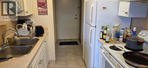150 Park Unit# 908, Windsor, ON - Indoor Photo Showing Kitchen With Double Sink