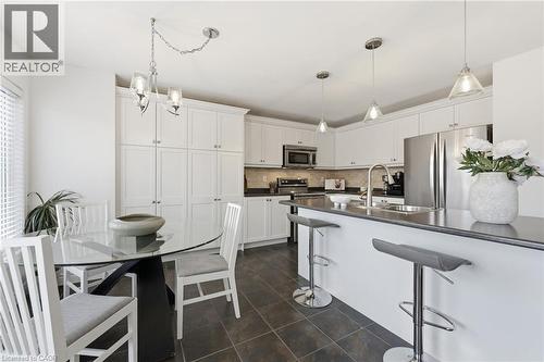910 Vickerman Way, Milton, ON - Indoor Photo Showing Kitchen With Double Sink With Upgraded Kitchen