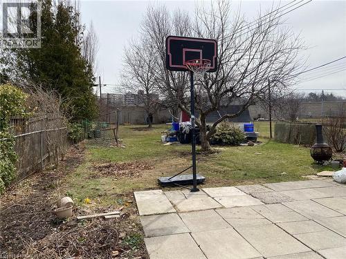 View of fenced backyard - 10 Armstrong Avenue, Hamilton, ON - Outdoor