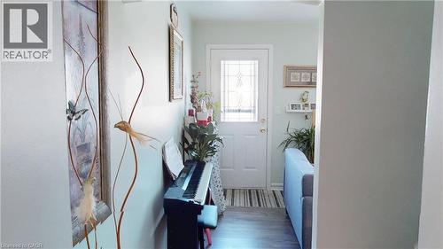 Entryway featuring wood finished floors - 10 Armstrong Avenue, Hamilton, ON - Indoor Photo Showing Other Room