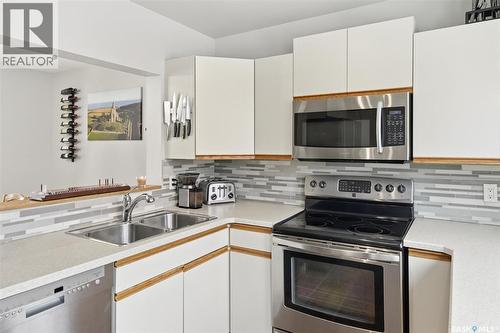 14 455 Pinehouse Drive, Saskatoon, SK - Indoor Photo Showing Kitchen With Double Sink