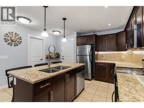 10529 Powley Court Unit# 305, Lake Country, BC - Indoor Photo Showing Kitchen With Stainless Steel Kitchen With Double Sink With Upgraded Kitchen