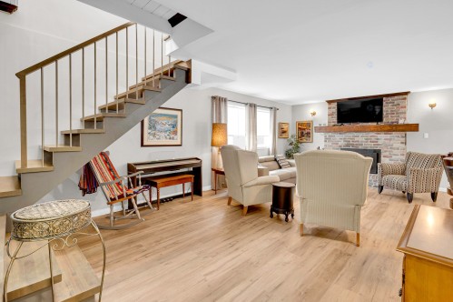 Salon - 345 Rue Des Rochers, Sainte-Adèle, QC - Indoor With Fireplace
