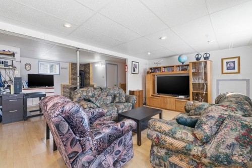 Salle familiale - 217 Rue Tassé, Saint-Eustache, QC - Indoor Photo Showing Living Room