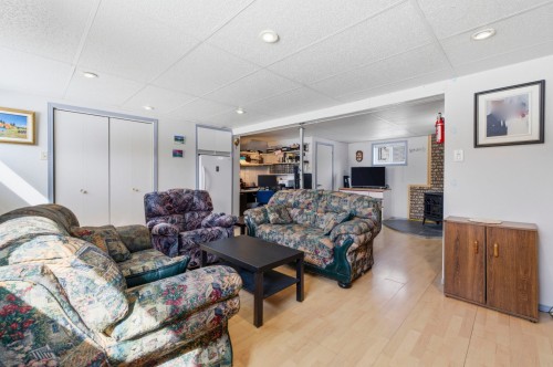 Salle familiale - 217 Rue Tassé, Saint-Eustache, QC - Indoor Photo Showing Living Room