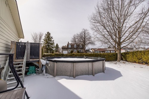 Cour - 217 Rue Tassé, Saint-Eustache, QC - Outdoor With Above Ground Pool