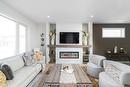 73 Ken Oblik Drive, Winnipeg, MB  - Indoor Photo Showing Living Room With Fireplace 