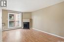 208B 4040 8Th Street E, Saskatoon, SK  - Indoor Photo Showing Living Room With Fireplace 