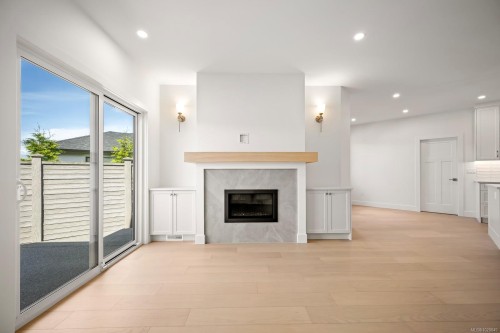 #3-865 Grumman Pl, Comox, BC - Indoor Photo Showing Living Room With Fireplace