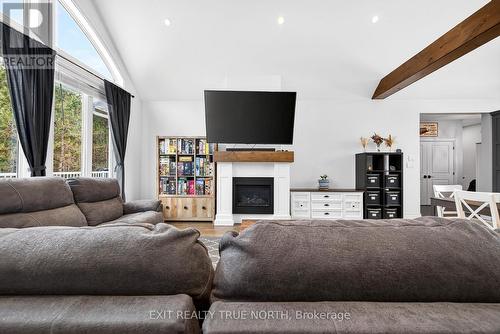 139 Rue Eric, Tiny, ON - Indoor Photo Showing Living Room With Fireplace