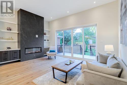 62 Ash Crescent, Toronto, ON - Indoor Photo Showing Living Room With Fireplace