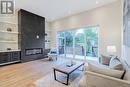 62 Ash Crescent, Toronto, ON  - Indoor Photo Showing Living Room With Fireplace 