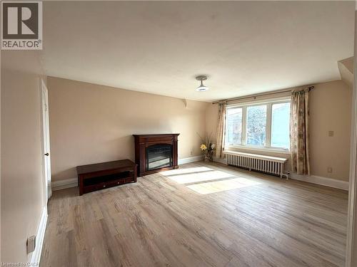 218 Weber Street E, Kitchener, ON - Indoor Photo Showing Living Room With Fireplace