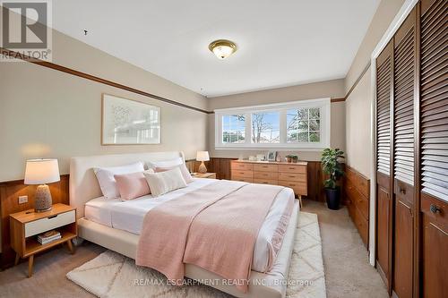 Virtually staged. Furniture/décor digitally added. - 156 Chesley Street, Hamilton, ON - Indoor Photo Showing Bedroom