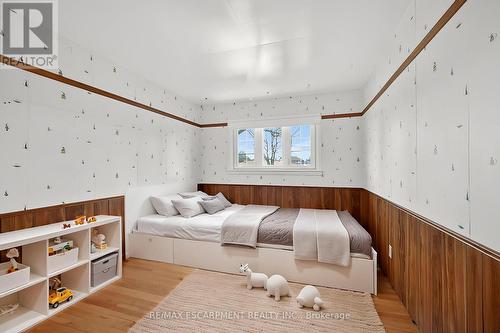 Virtually staged. Furniture/décor digitally added. - 156 Chesley Street, Hamilton, ON - Indoor Photo Showing Bedroom
