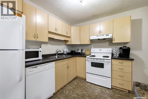 129 5063 James Hill Road, Regina, SK - Indoor Photo Showing Kitchen With Double Sink