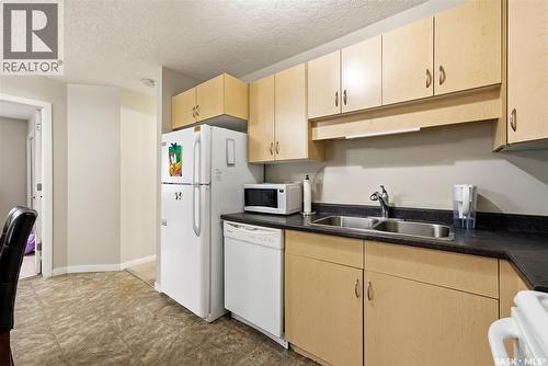 129 5063 James Hill Road, Regina, SK - Indoor Photo Showing Kitchen With Double Sink