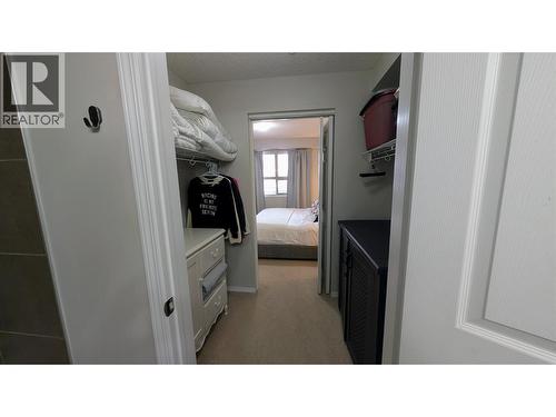 view from En-suite  through walk-in closet to Primary Bedroom - 205 Third Avenue Unit# 3307, Invermere, BC - Indoor