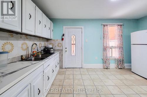 204 Sherman Avenue N, Hamilton, ON - Indoor Photo Showing Kitchen With Double Sink