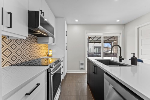Cuisine - 1531 Rue St-André, L'Assomption, QC - Indoor Photo Showing Kitchen With Double Sink With Upgraded Kitchen