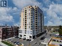 View of apartment building / complex with uncovered parking - 191 King Street S Unit# 712, Waterloo, ON  - Outdoor With Balcony With Facade 
