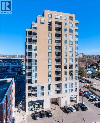 View of apartment building / complex with uncovered parking - 191 King Street S Unit# 712, Waterloo, ON - Outdoor With Balcony With Facade