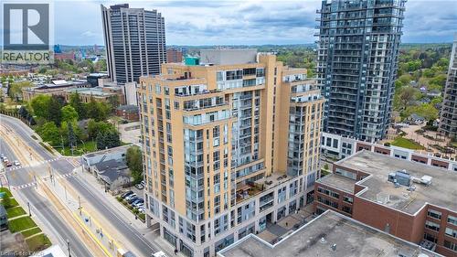 View of building exterior featuring a city view - 191 King Street S Unit# 712, Waterloo, ON - Outdoor With Facade