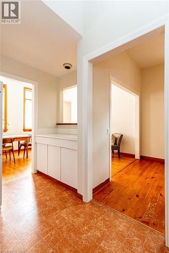 Corridor featuring baseboards - 218 Bay Street S, Hamilton, ON 