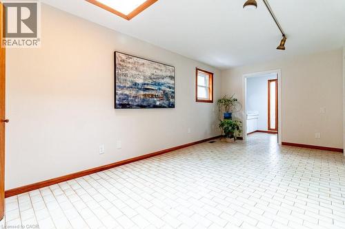 Spare room with baseboards - 218 Bay Street S, Hamilton, ON 