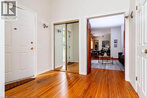 Entrance foyer featuring light wood-style floors and baseboards - 218 Bay Street S, Hamilton, ON 