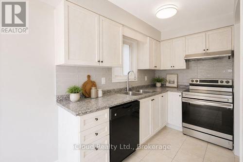3956 Manatee Way, Mississauga, ON - Indoor Photo Showing Kitchen With Double Sink