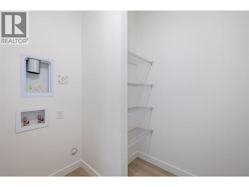 Laundry - 442 Arrowleaf Rise, Coldstream, BC - Indoor With Storage