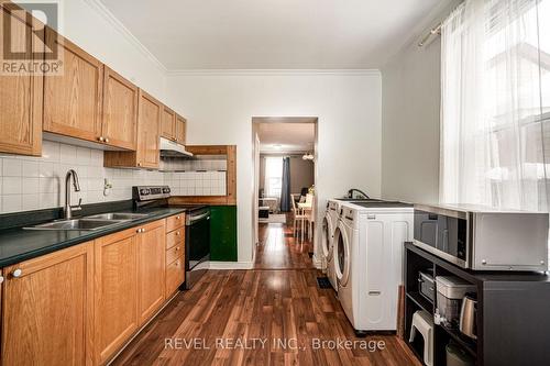 51 Tisdale Street N, Hamilton, ON - Indoor Photo Showing Kitchen With Double Sink